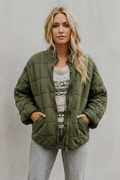 Veste matelassée molletonnée à col haut et zip pour femme