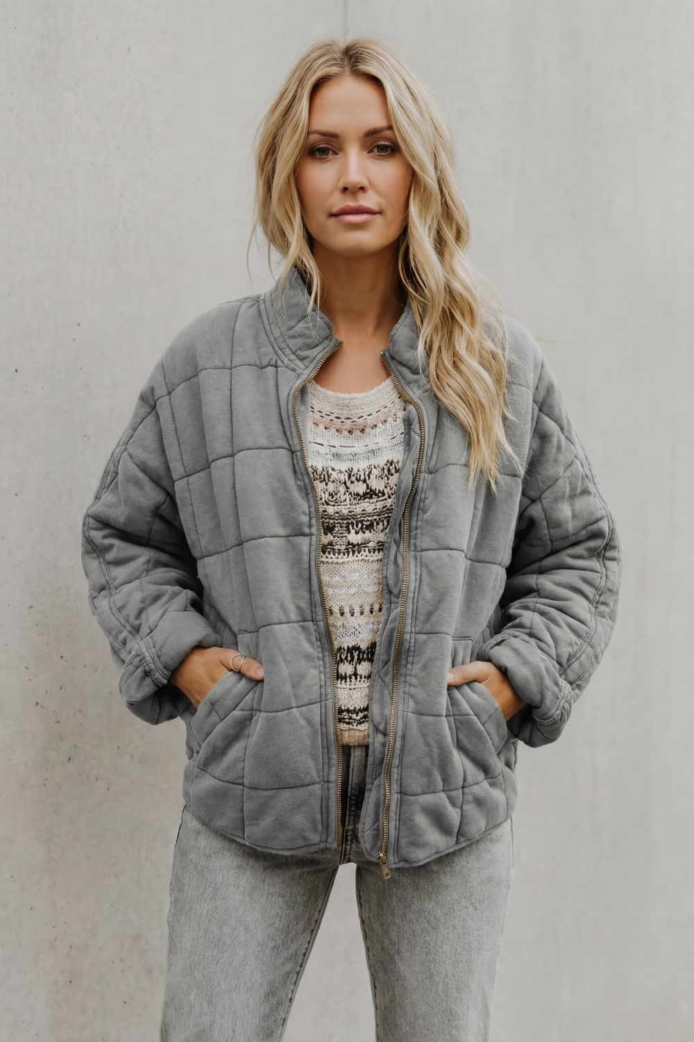 Veste matelassée molletonnée à col haut et zip pour femme
