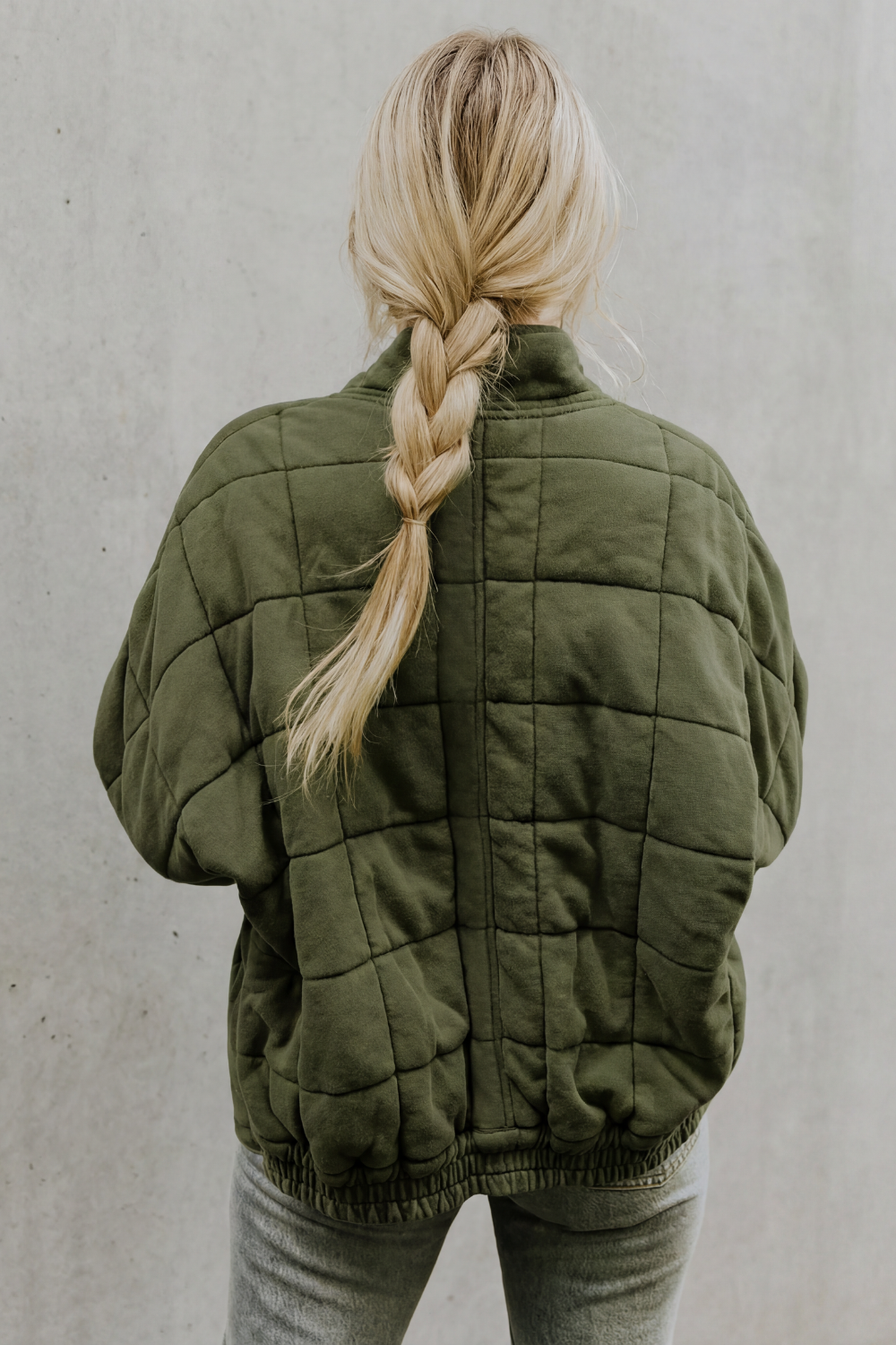 Veste matelassée molletonnée à col haut et zip pour femme