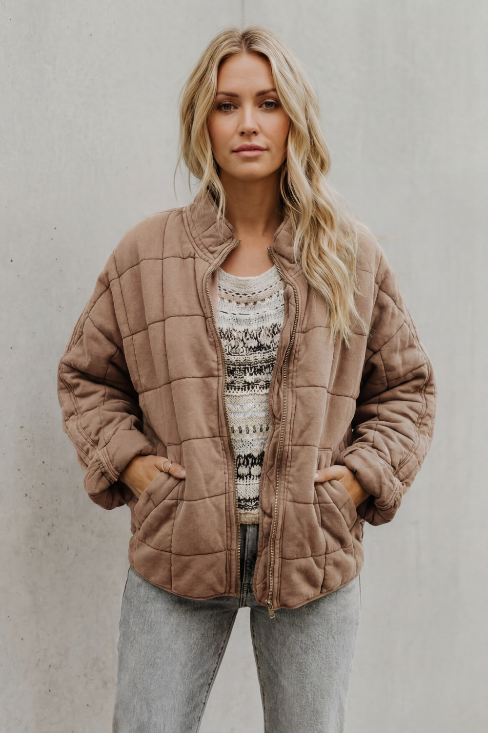 Veste matelassée molletonnée à col haut et zip pour femme