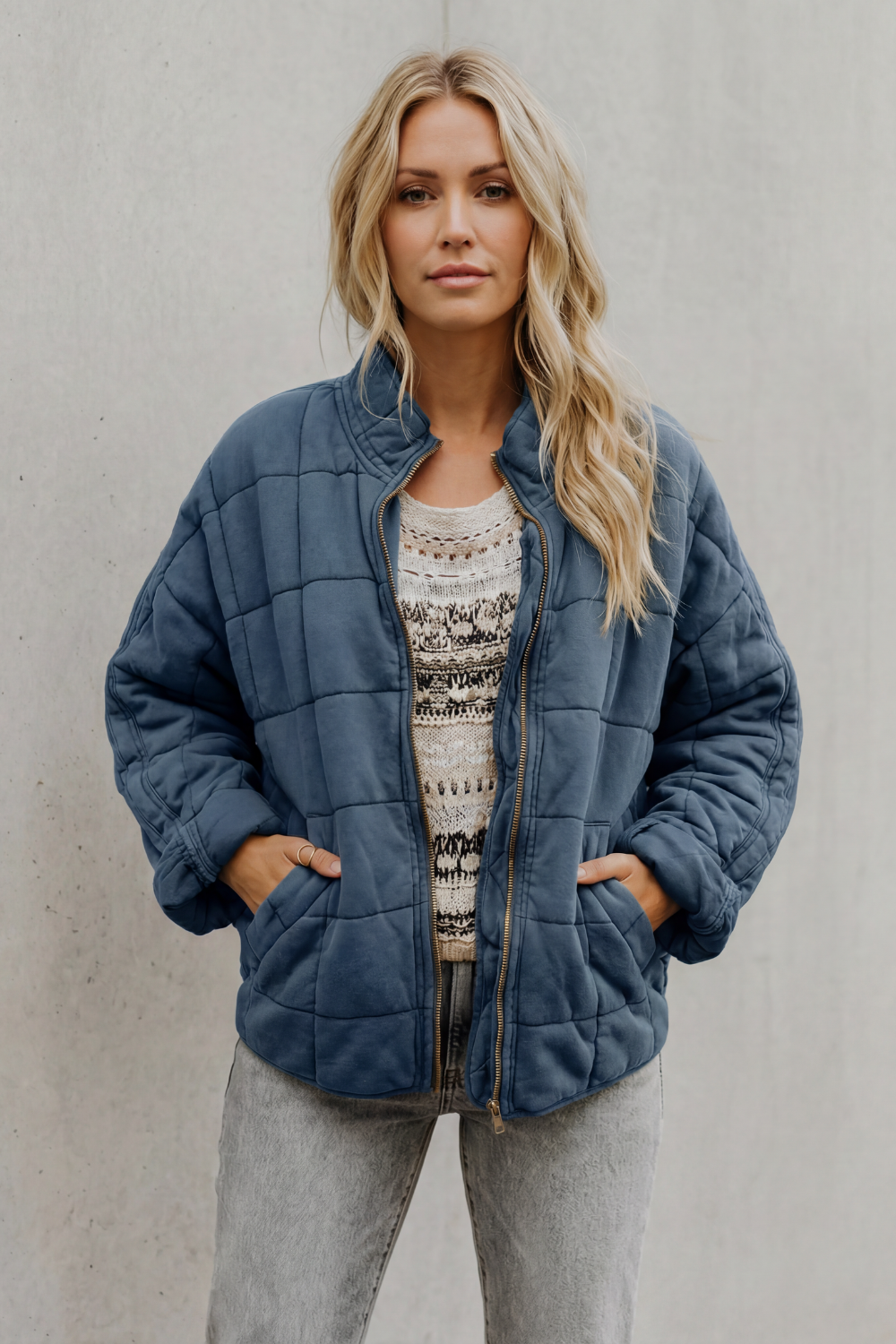 Veste matelassée molletonnée à col haut et zip pour femme