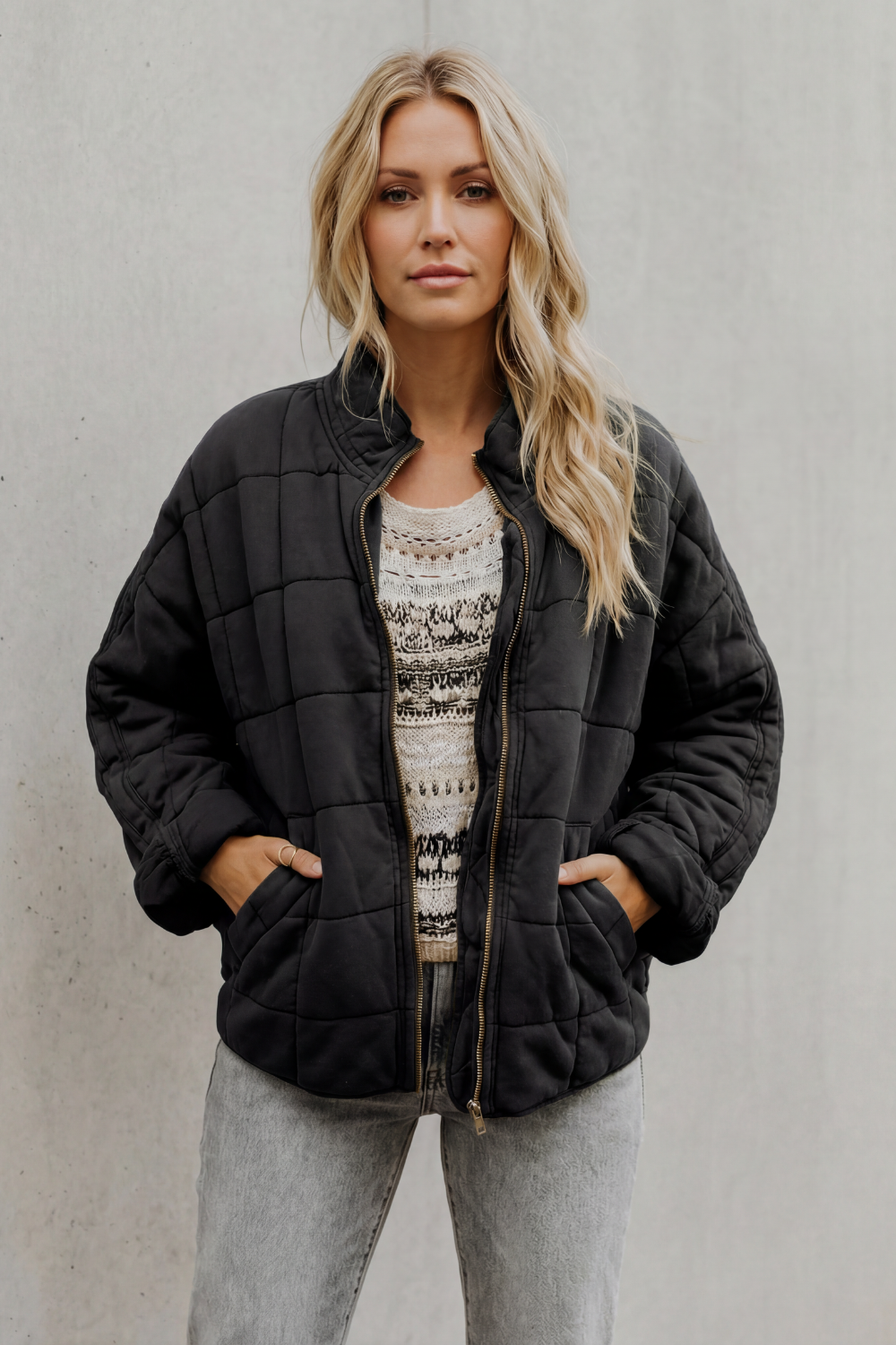 Veste matelassée molletonnée à col haut et zip pour femme