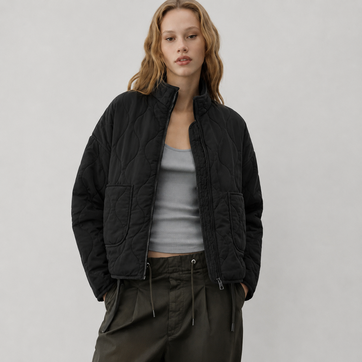 Veste matelassée à col montant et poches plaquées pour femme