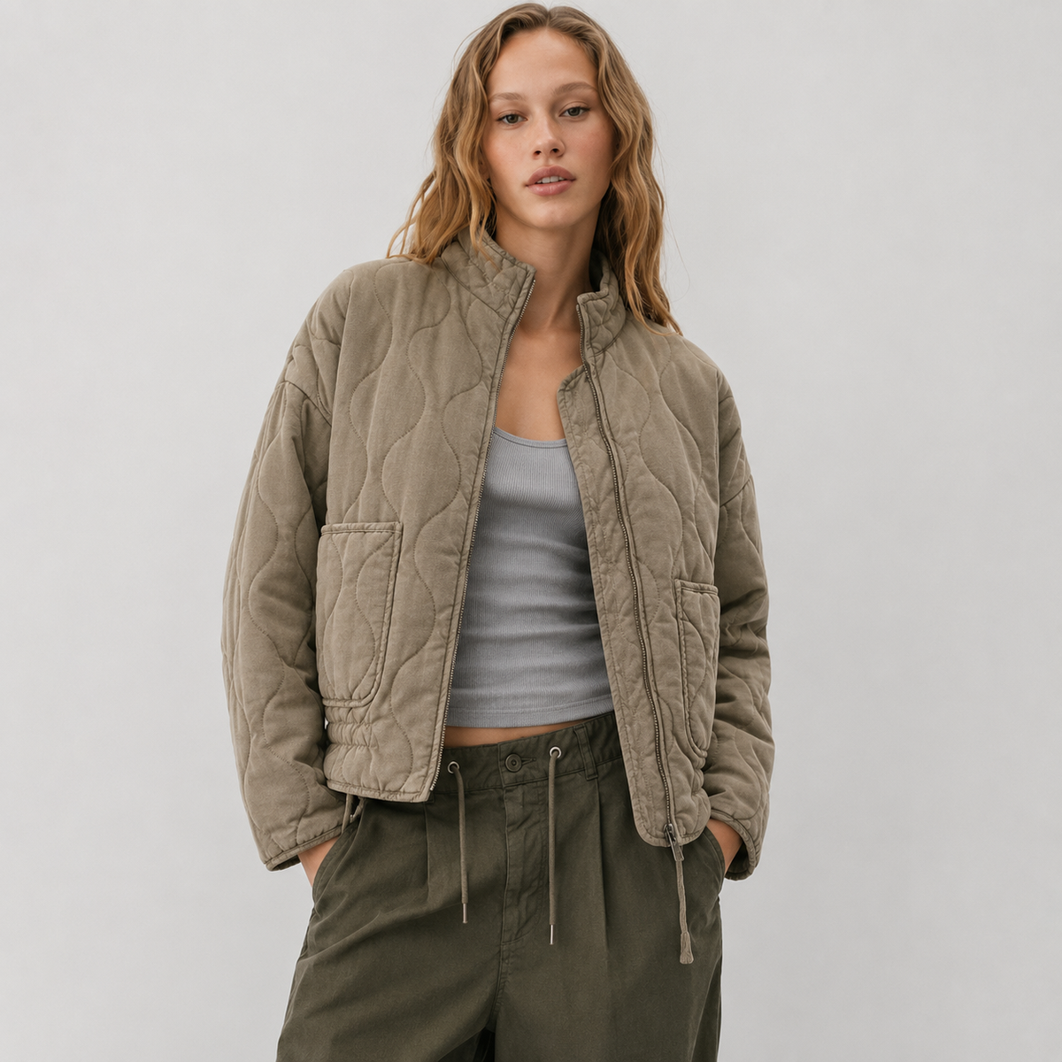 Veste matelassée à col montant et poches plaquées pour femme
