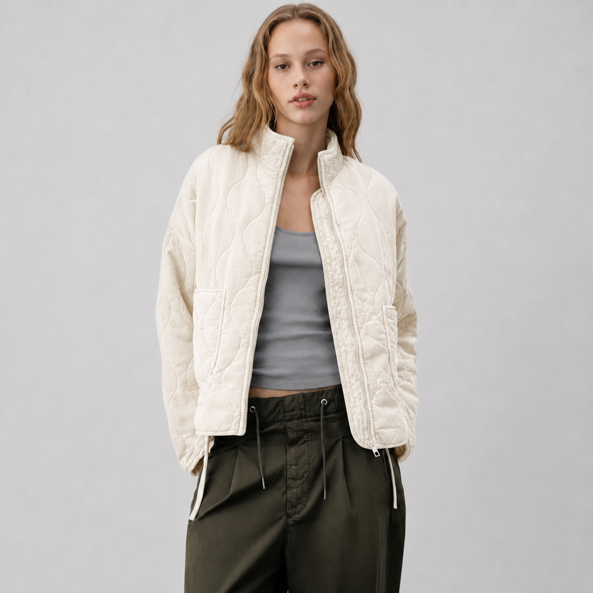 Veste matelassée à col montant et poches plaquées pour femme