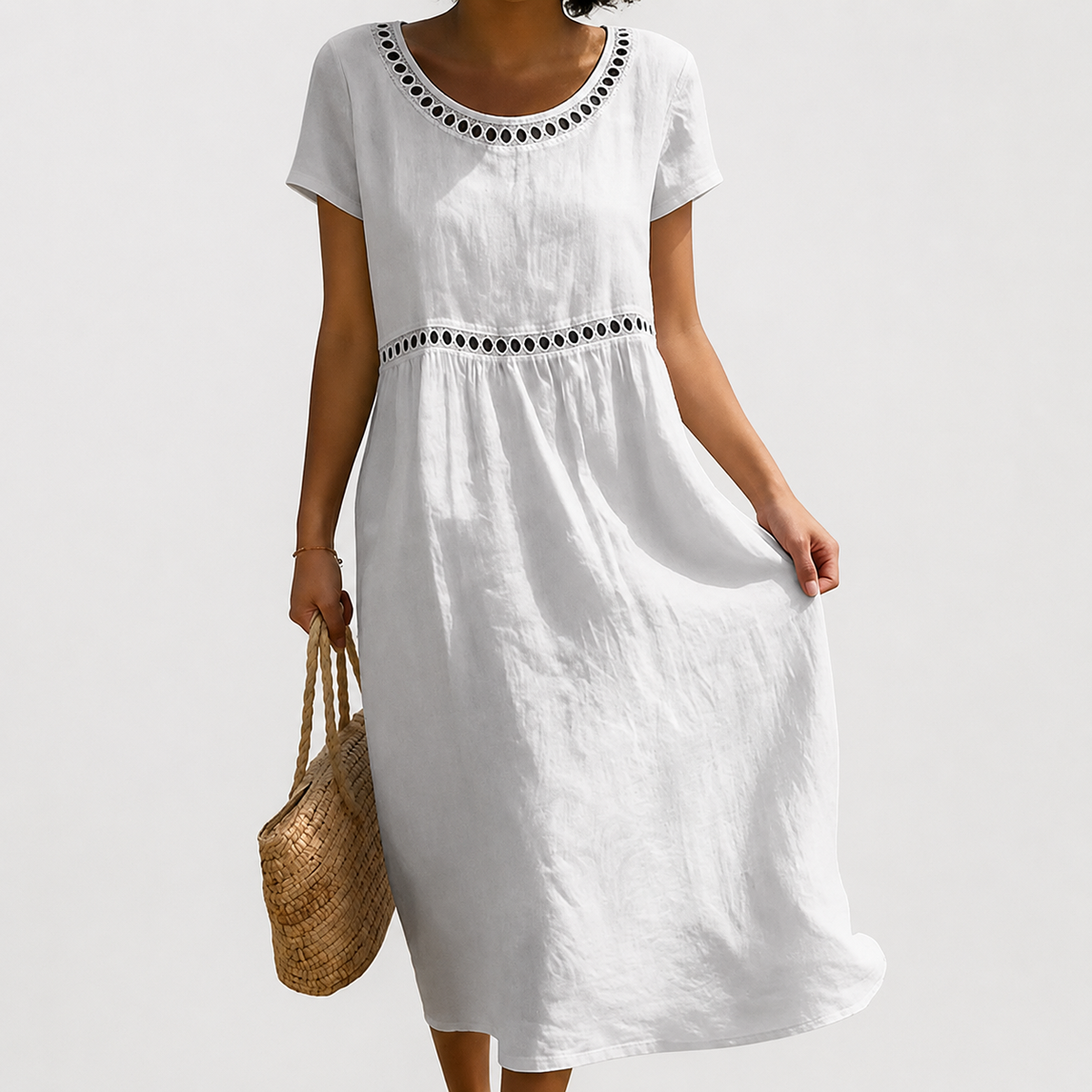 Robe en coton brodée à coupe empire pour femme