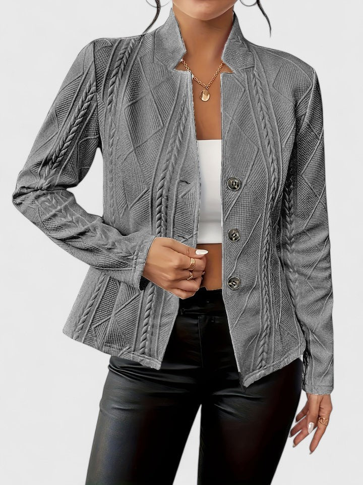Veste structurée à texture géométrique et col montant pour femme