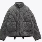 Veste matelassée à col montant et poches plaquées pour femme