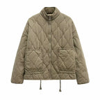 Veste matelassée à col montant et poches plaquées pour femme