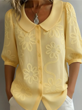 Women's blouse with embroidered floral pattern