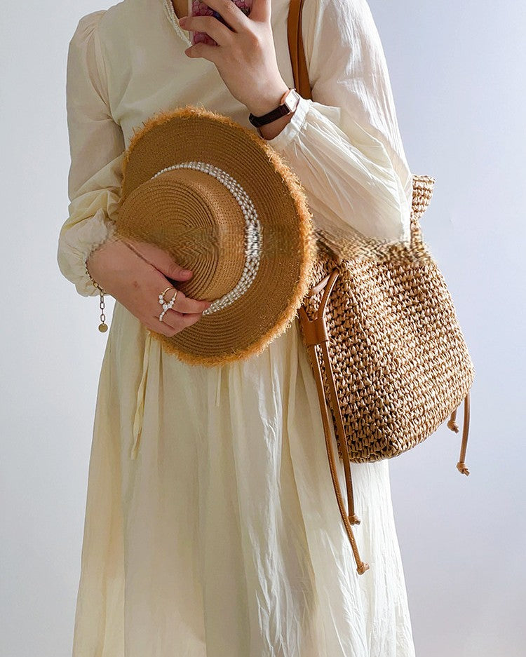 Women's bucket bag with drawstring closure