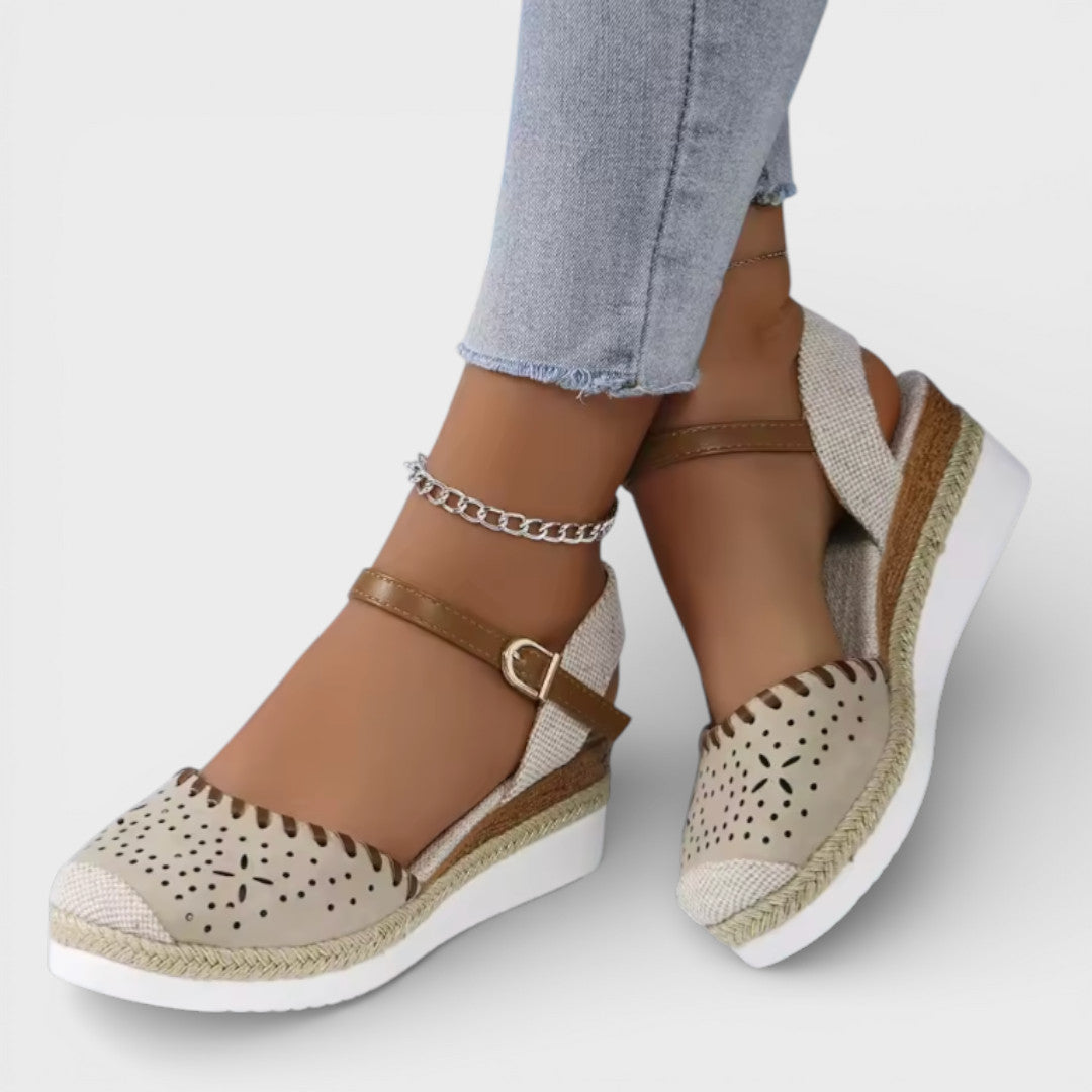 Women's closed-toe wedge espadrille sandals with perforated upper and braided sole