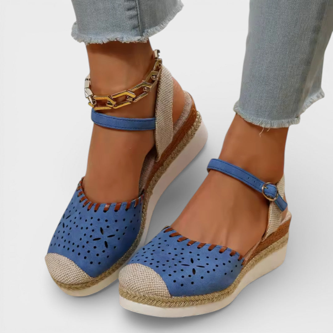 Women's closed-toe wedge espadrille sandals with perforated upper and braided sole