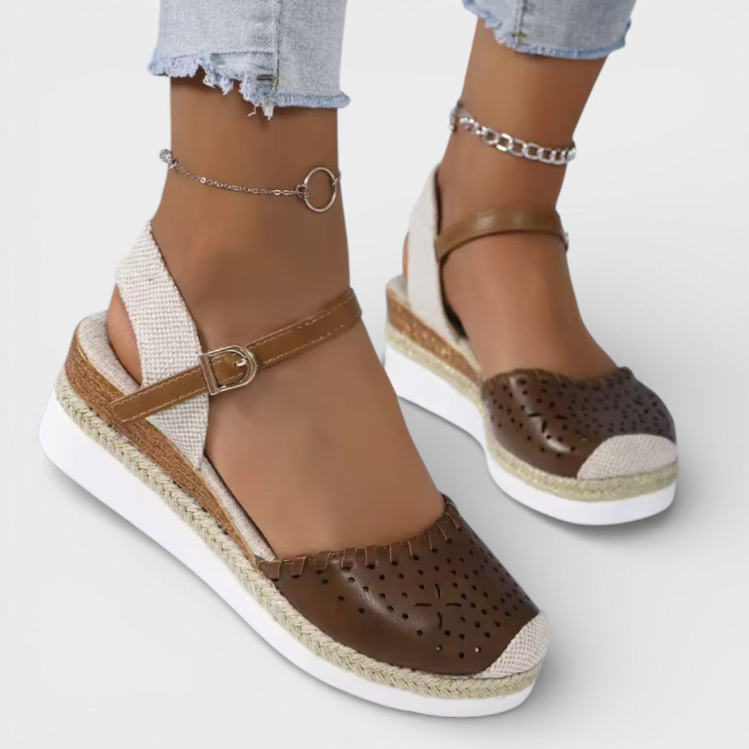 Women's closed-toe wedge espadrille sandals with perforated upper and braided sole
