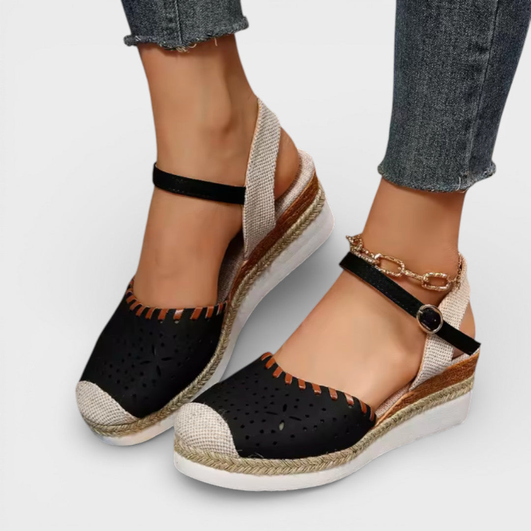 Women's closed-toe wedge espadrille sandals with perforated upper and braided sole