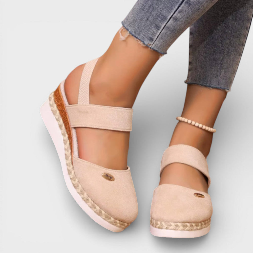 Women's closed-toe wedge sandals with ankle strap