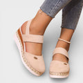 Women's closed-toe wedge sandals with ankle strap