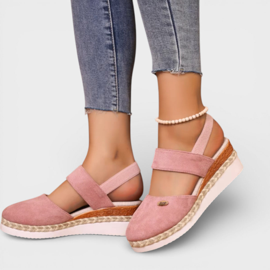 Women's closed-toe wedge sandals with ankle strap