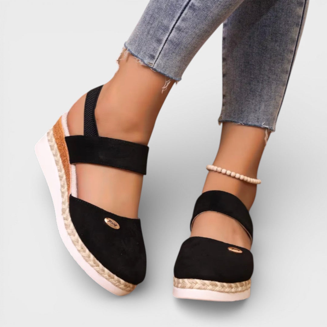 Women's closed-toe wedge sandals with ankle strap