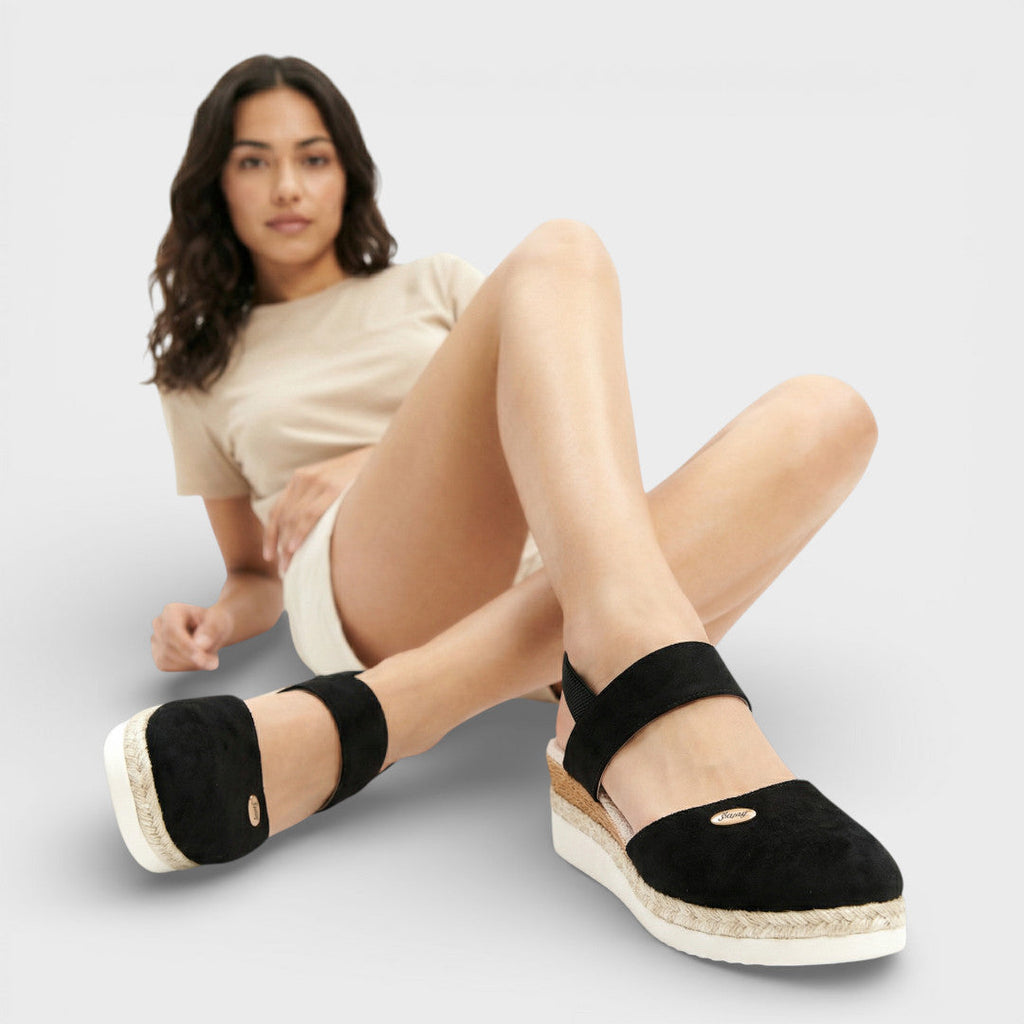 Women's closed-toe wedge sandals with ankle strap