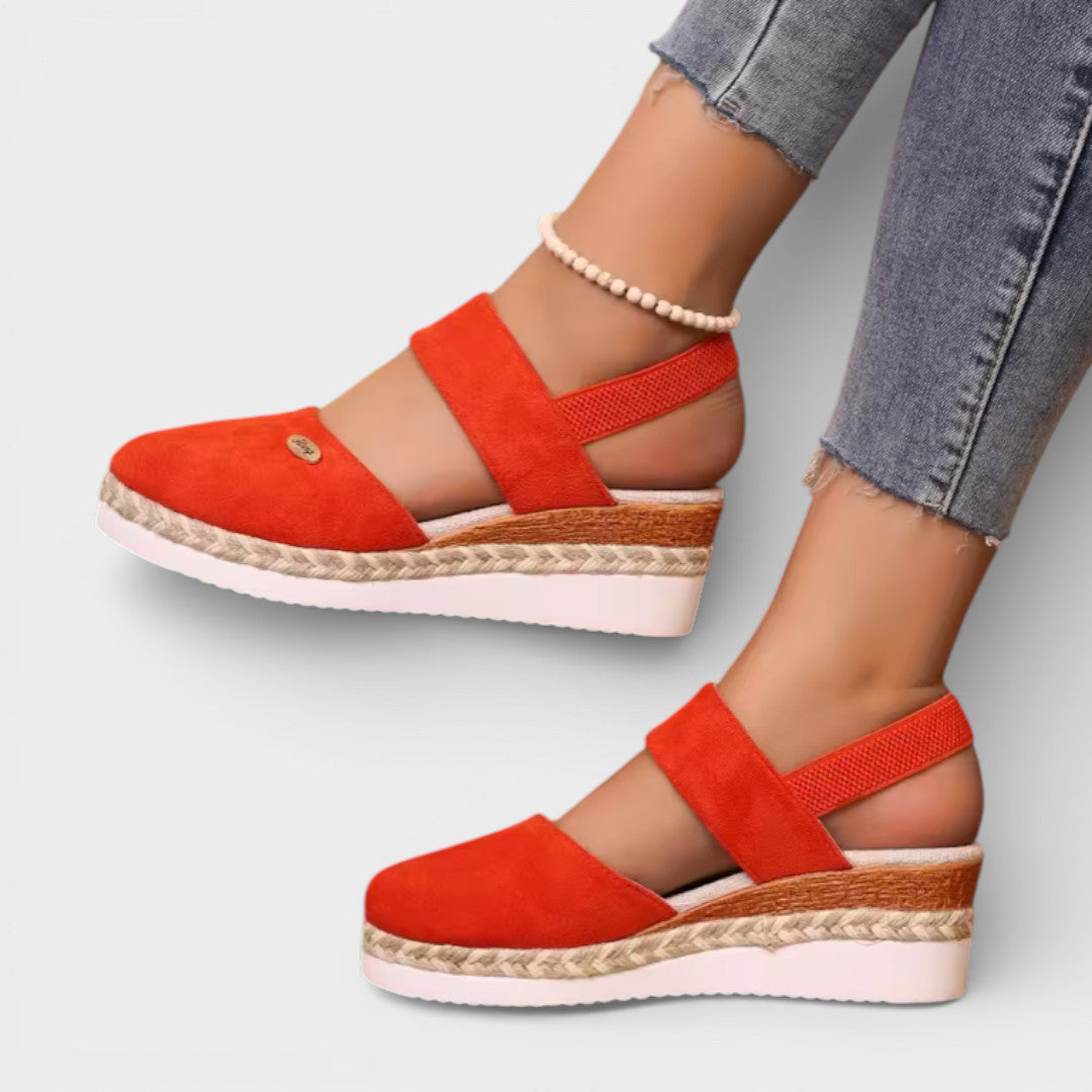 Women's closed-toe wedge sandals with ankle strap