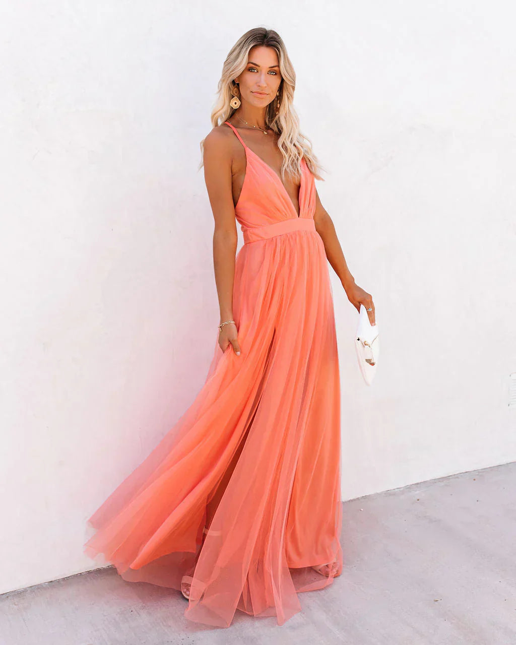 Women's cocktail dress with shoulder straps and short hemline
