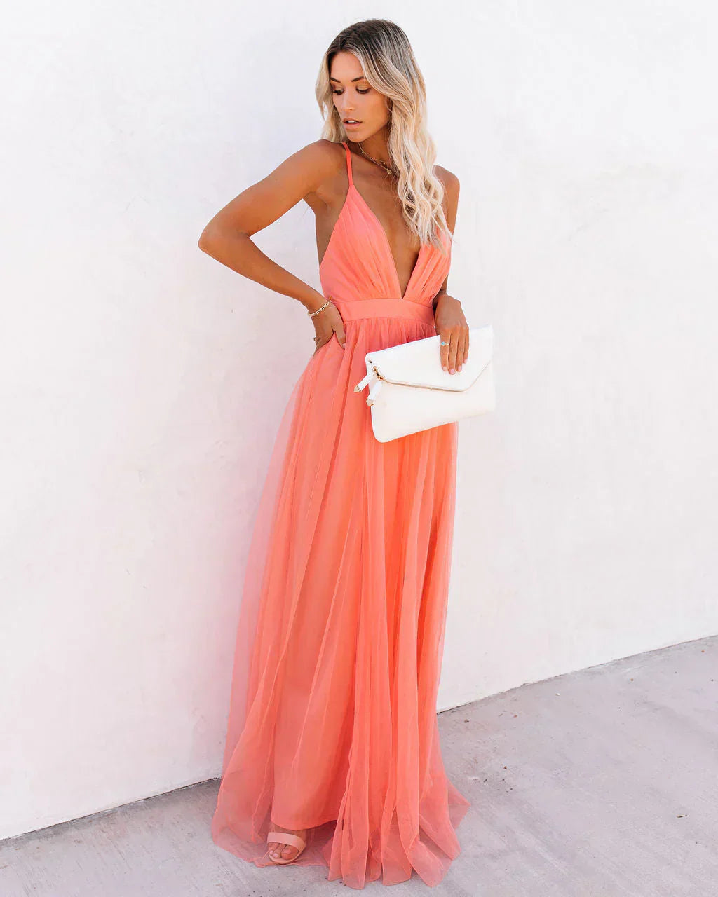 Women's cocktail dress with shoulder straps and short hemline