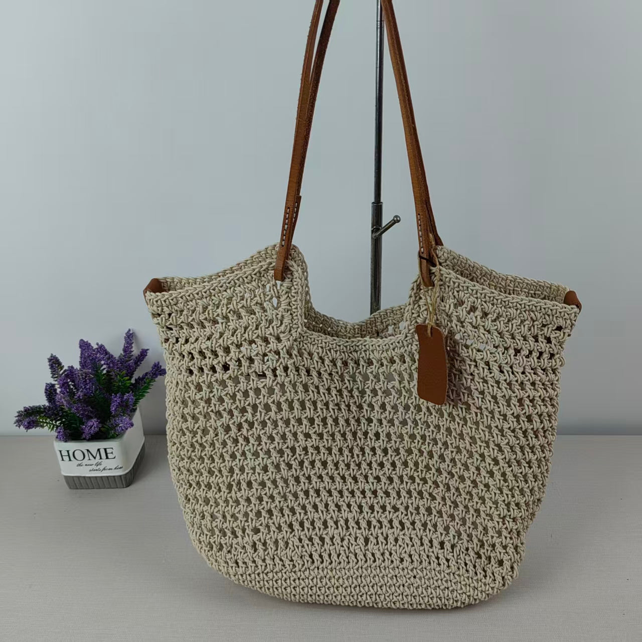 Women's crochet tote bag with woven construction and open top