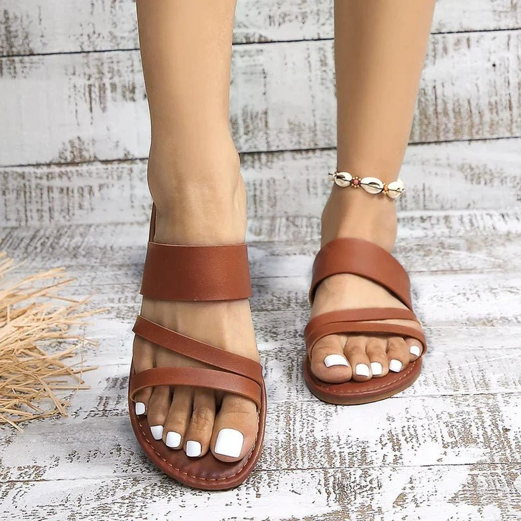 Women's cross-strap slip-on sandals with flat sole