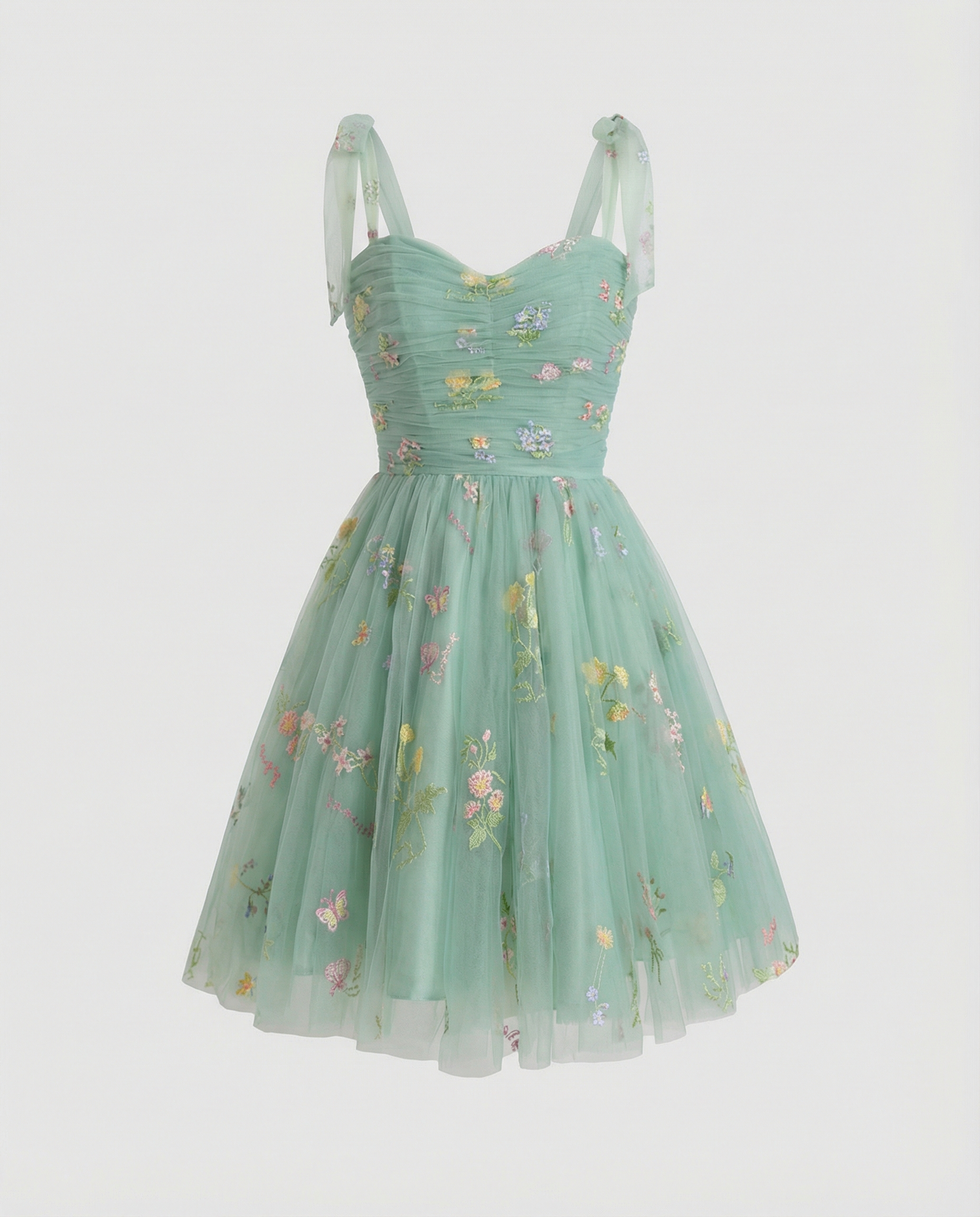 Women's floor-length ball gown with tulle skirt and structured bodice