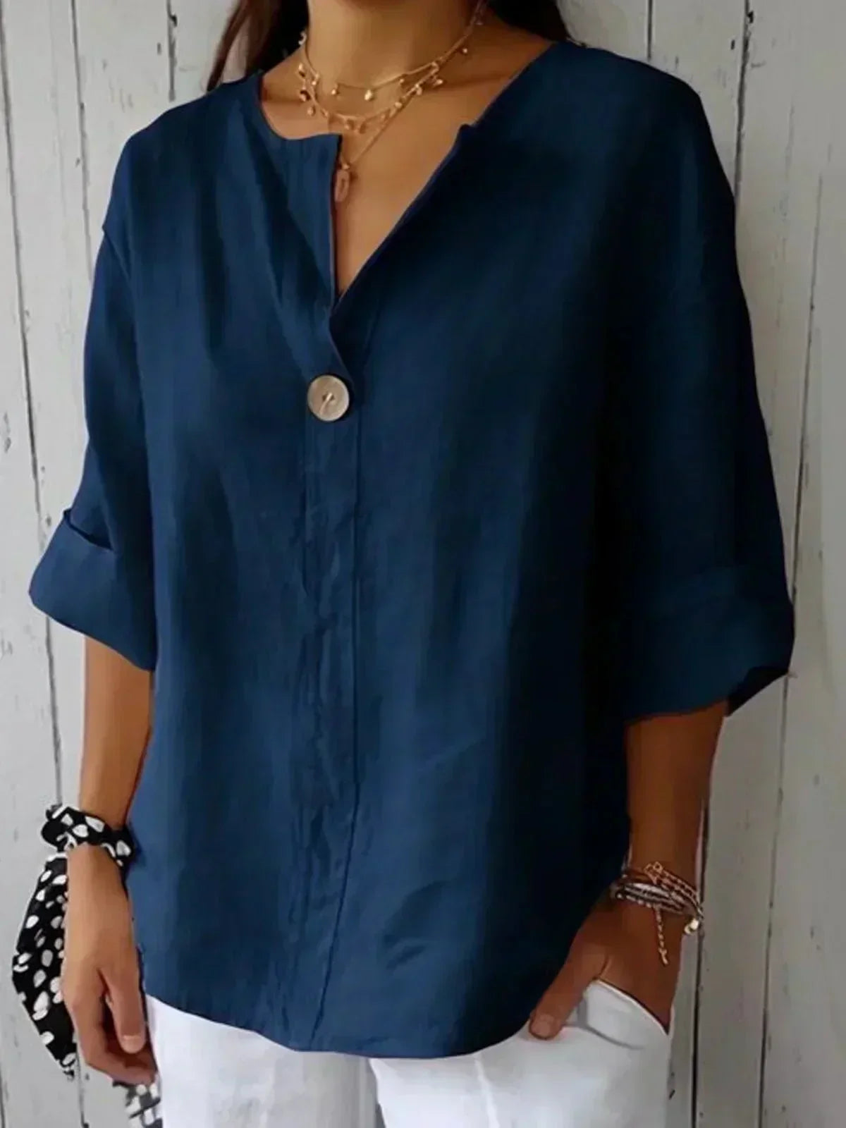 Women's oversized blouse with button fastening