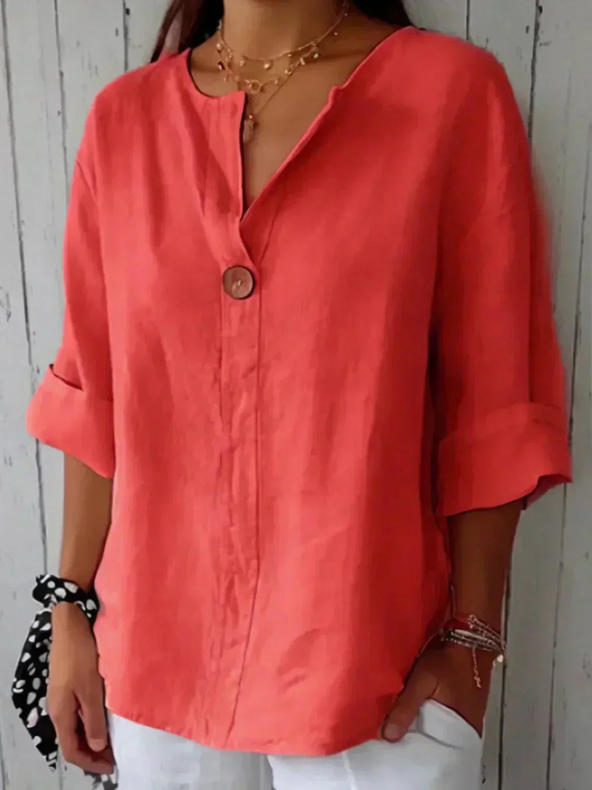 Women's oversized blouse with button fastening