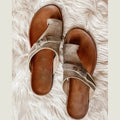 Women's sandals with toe loop and adjustable strap