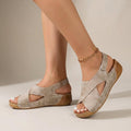Women's wedge sandals with criss-cross straps and slingback