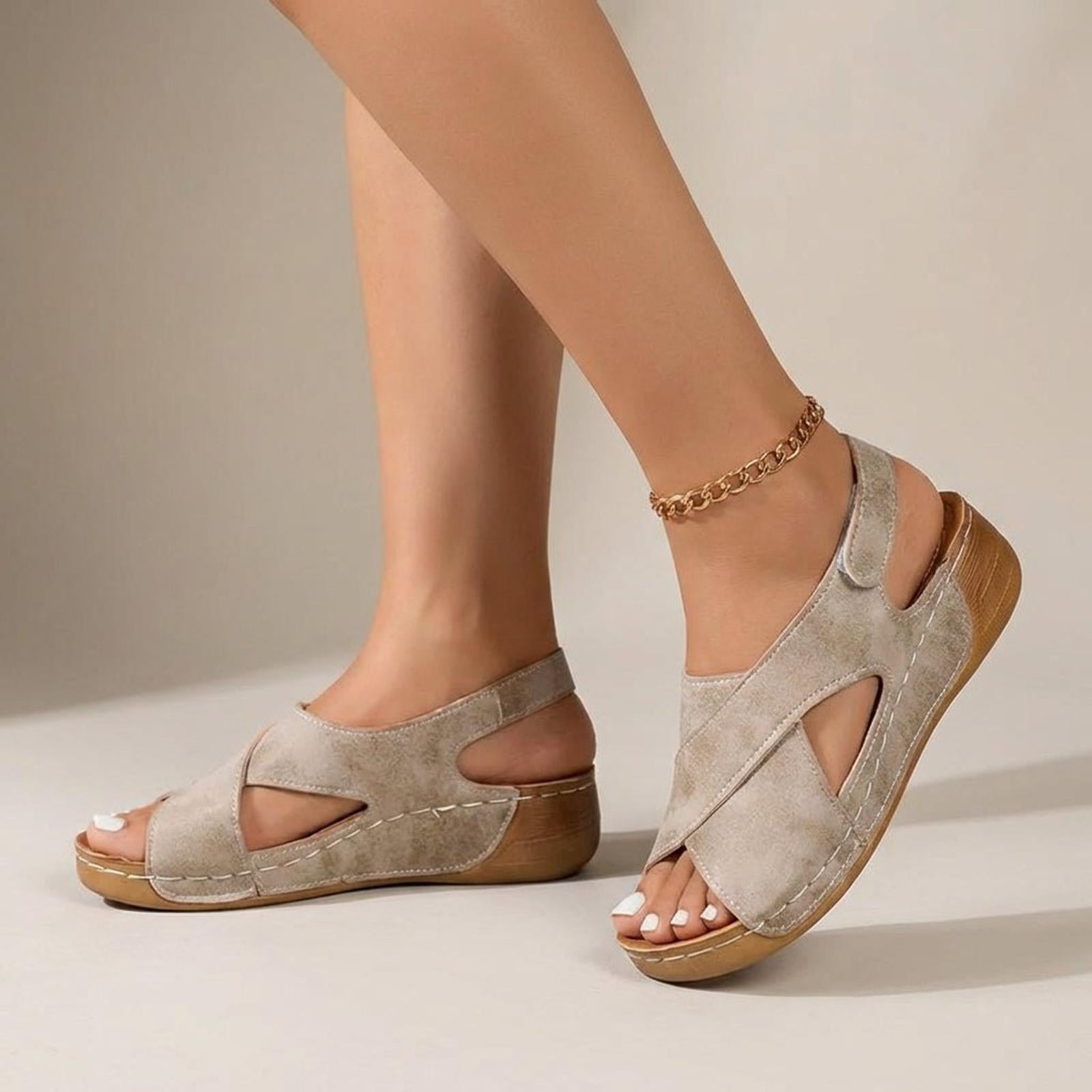 Women's wedge sandals with criss-cross straps and slingback