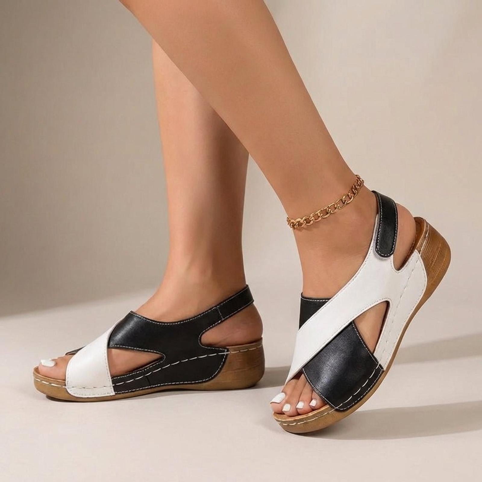 Women's wedge sandals with criss-cross straps and slingback