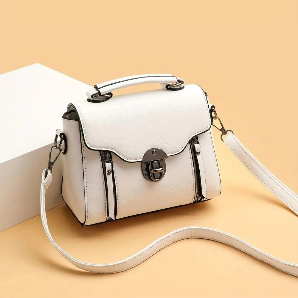 Sac bandoulière femme à rabat, poignée supérieure et fermeture à boucle