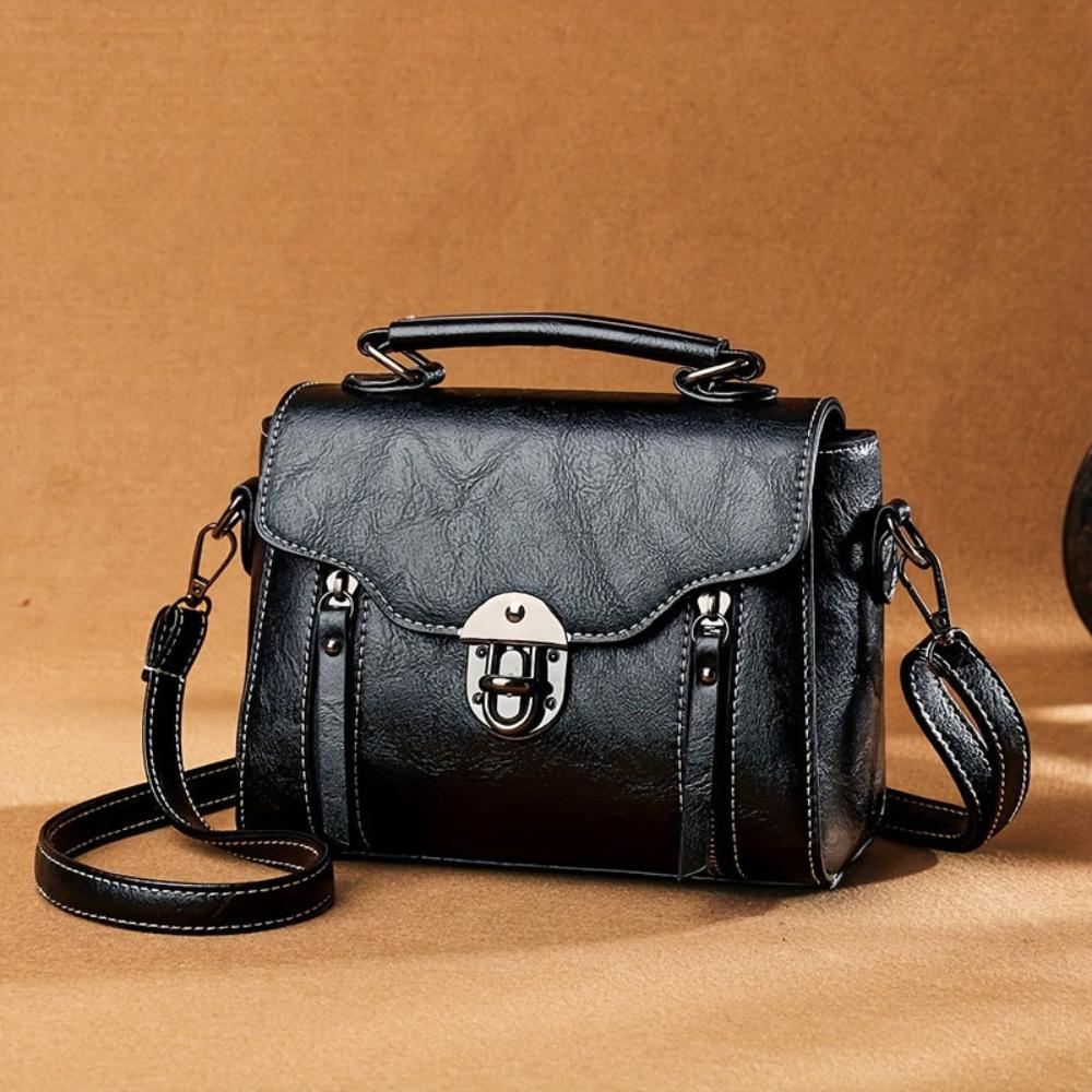 Sac bandoulière femme à rabat, poignée supérieure et fermeture à boucle